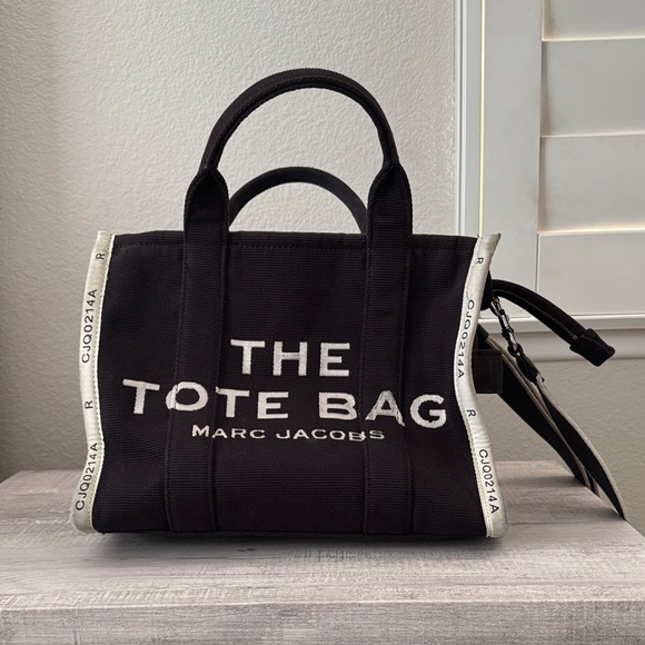 Marc Jacobs Handbags - Marc Jacobs Black Canvas 'The Tote Bag' with White Trim